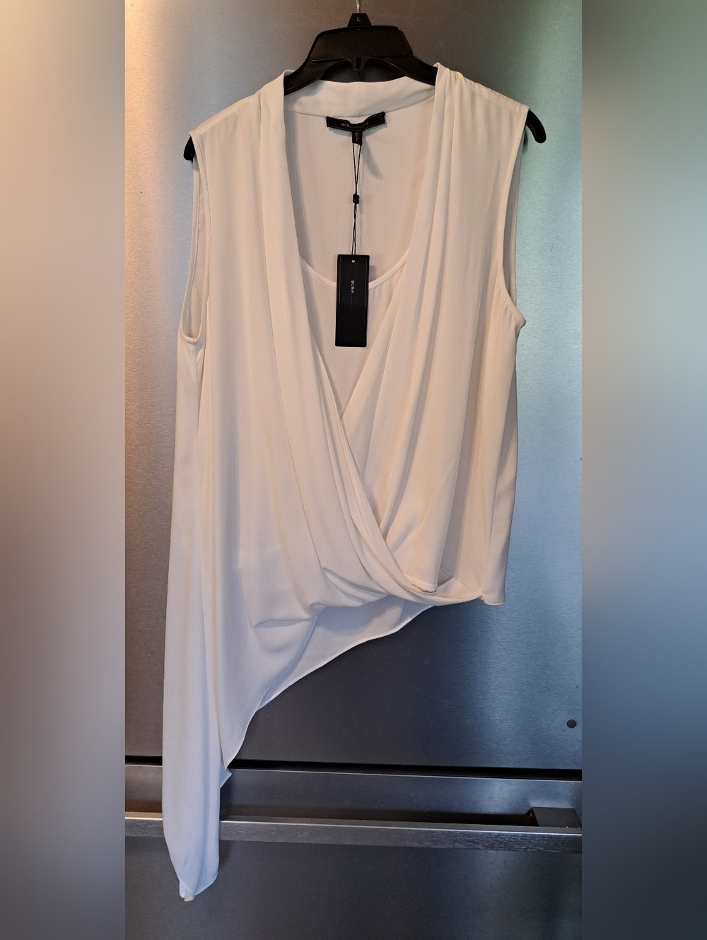 NWT BCBGMAXAZRIA “Cecil” White  Sleeveless Asymmetrical Hem Top Blouse Event L
